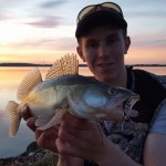 Oliver Jenkinson with a reservoir zander taken on a Hunmungous at dusk.